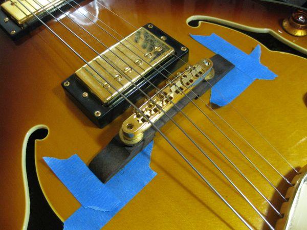 What is a Floating Bridge Guitar?