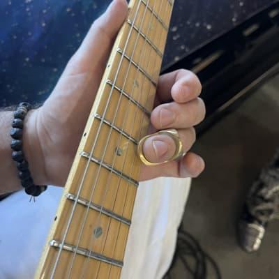 What is a Fingertip Guitar Slide?