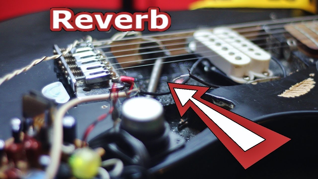 Inside view of classic spring reverb mechanism in a guitar setup