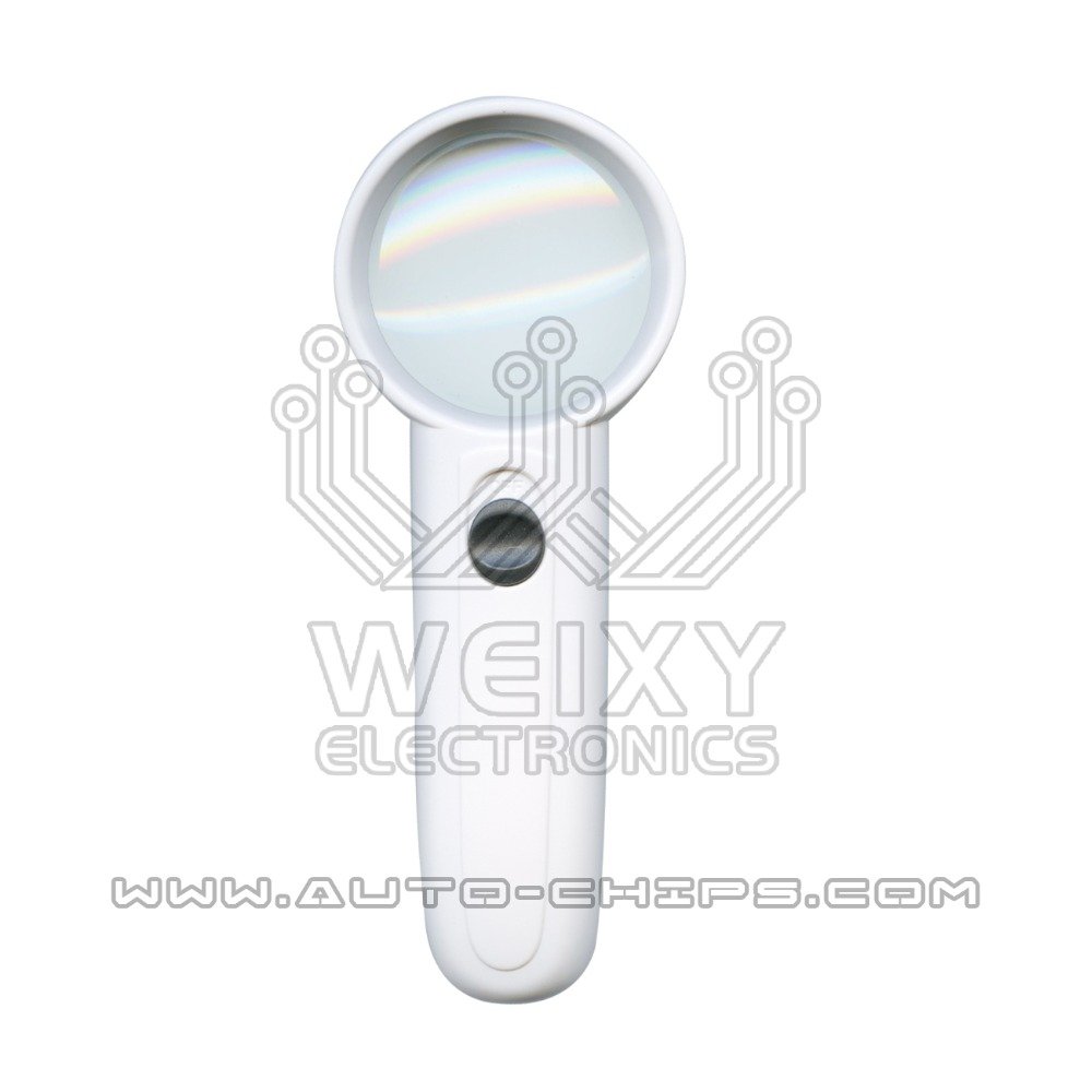 Magnifying glass being used to observe a small integrated circuit (IC) serial number — directly represents manually inspecting and decoding tiny serial numbers when an online lookup is unavailable.